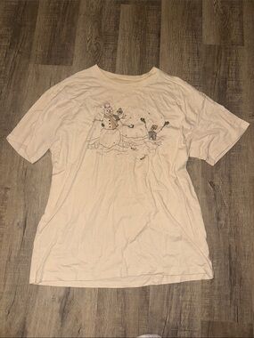 Woman’s oversized graphic tee- snowman skeleton, cute and festive